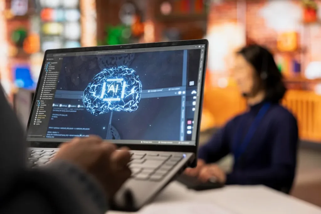 Pessoa trabalhando em laptop com uma representação visual de machine learning e inteligência artificial.